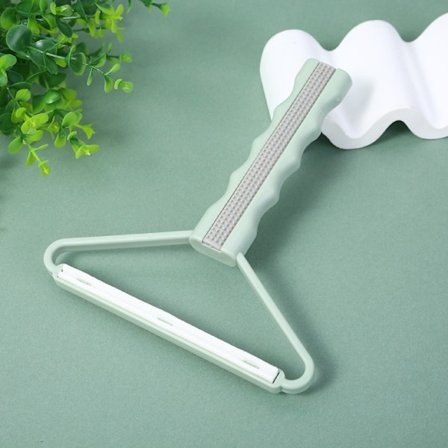 Karvanpoistoaine nukkaa puhdistava työkalu turkinpoistoharja