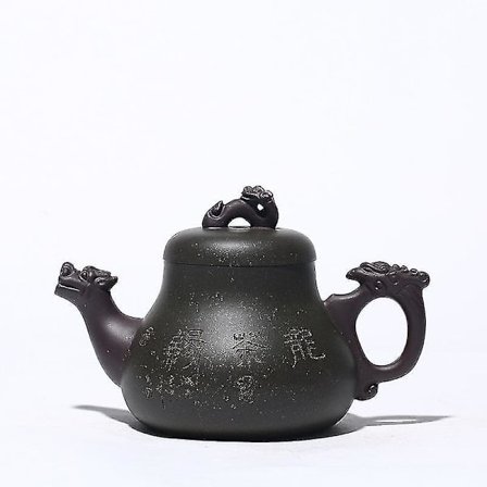 Håndlaget drage-tekanne i lilla leire