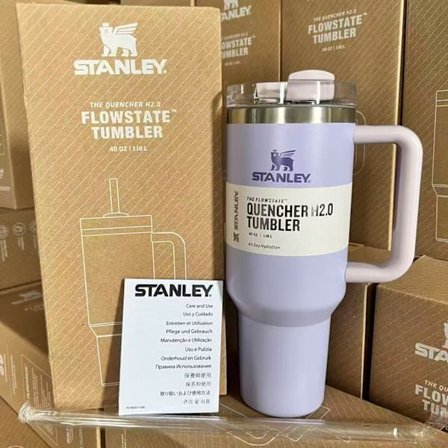 Suuri 1,2 litran ruostumattomasta teräksestä valmistettu juomamuki kahvalla ja pillillä automatkoille