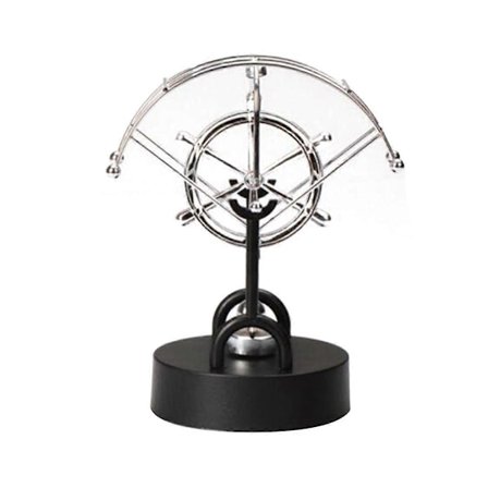 Kontorpynt i smijern formet som cruiseskip, roterende delfin, evighetsmaskin