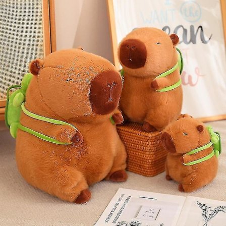 Capibara docka med sköldpadda baksida sittande pose vatten marsvin plysch leksak Capybara kudde docka