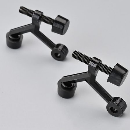 Dørstopper med hengselstift, skjulte dørstoppere