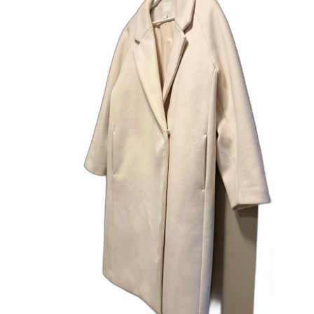 Ljusbeige kappa med knappar