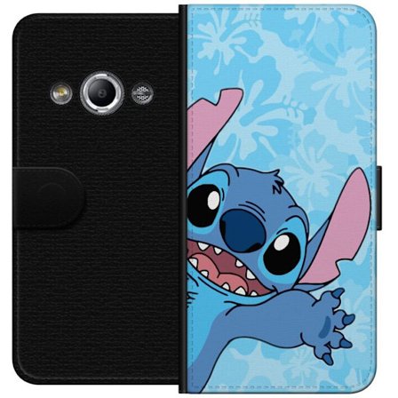 Kompatibelt Lommeboketui til Samsung Galaxy Xcover 3 Leken illustrasjon av Stitch som strekker seg mot kameraet på lyseblå blomstret bakgrunn