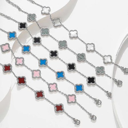 Smycken med fyrklöver, armband i titanstål