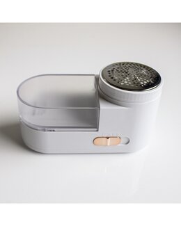 Fnugfjerner med stofbørste