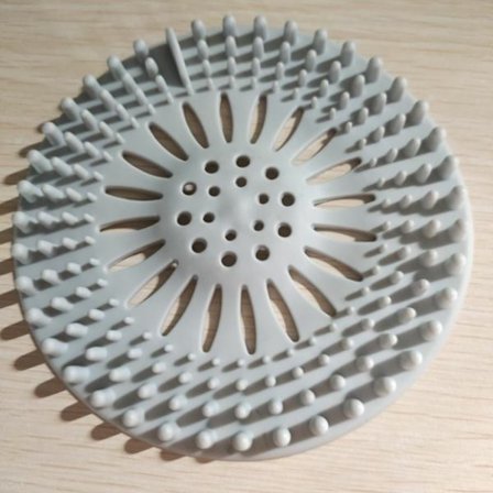 Hårstopper i holdbart silikone til afløb i bruser