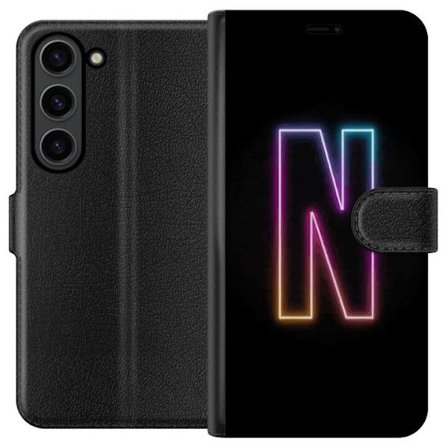 Kompatibelt Plånboksfodral till Samsung Samsung Galaxy S24+ Minimalistisk neonbokstav N i färgskiftande ljus mot svart bakgrund