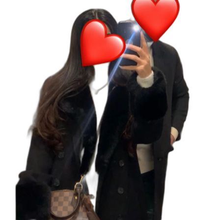 Svart kappa med fuskpälsdetaljer