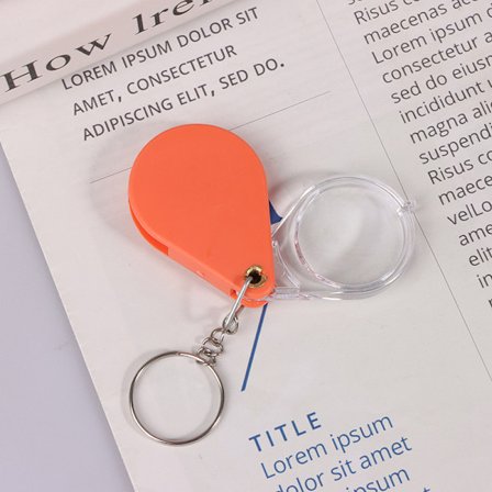 Lomme oransje forstørrelsesglass Liten håndholdt sammenleggbar nøkkelring