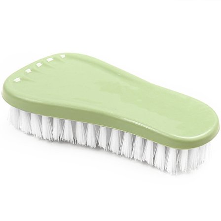 En dejlig nordisk grøn fodvaskbørste er en alsidig rengøring