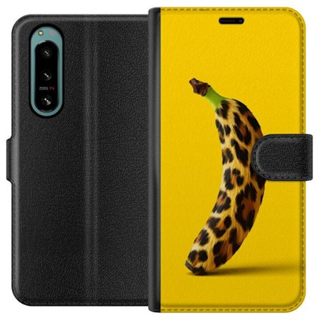 Yhteensopiva Lompakkokotelo Sony Sony Xperia 5 IV Banaani leopardikuvioilla keltaista taustaa vastaan luovassa ja leikkisässä suunnittelussa