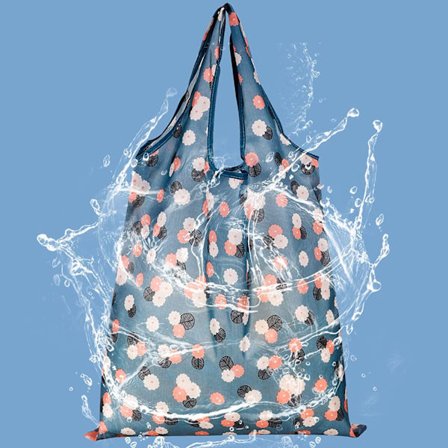 En liten återanvändbar shoppingväska med prästkrage, en hopfällbar shoppingväska, en tvättpåse, en miljövänlig hopfällbar shoppingväska för vardagliga