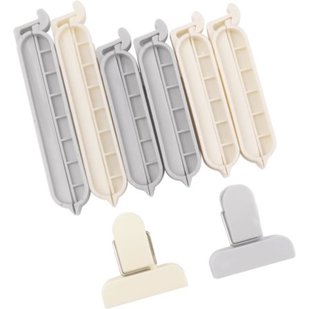 8 kpl Leipäpussinsulkijoita, kaksi erilaista ruokapussia, pursotinpussin pidikkeitä ruokapaketeille ja suljettaville pusseille, harmaa ja valkoinen