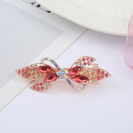 2 st stora hårklämmor med hästsvans i strass, fyrbladsdesign