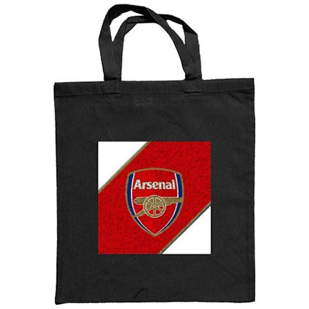 Kangaskassi Moschino Toy nallekarhu yksinkertaisella piirroksellisella suunnittelulla, ruskea karhu valkoisessa paidassa ja selvä logotyyppi mustalla