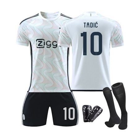 23/24 Ajax udebanebørnefodboldsæt med sokker og beskyttelsesudstyr