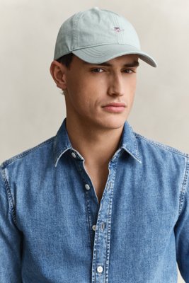 GANT - Solbleket caps med skjold til herre washed turquoise