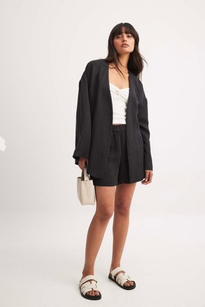 NA-KD - Shorts i lyocell med elastisk midje - Shorts med høyt liv - Svart - EU 32