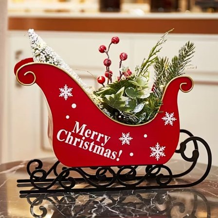 Ny ankomst juleslæde med lys juledekorationer