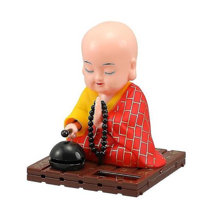 Bilde av Buddha på dashbordet i bilen, liten Buddha-statue, PK (FMY)