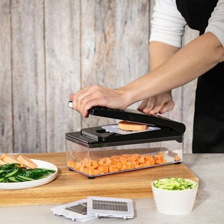 Manuel grøntsagshakker med 7 udskiftelige knive og fingerbeskyt