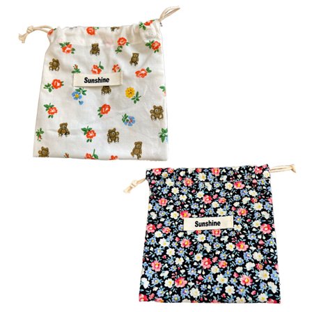 Liten blommig tampongförvaringspåse i bomull med dragsko