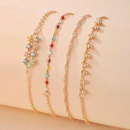 Sett med 4 orientalske rhodiumbelagte armbånd med steinsmykker Gold one size