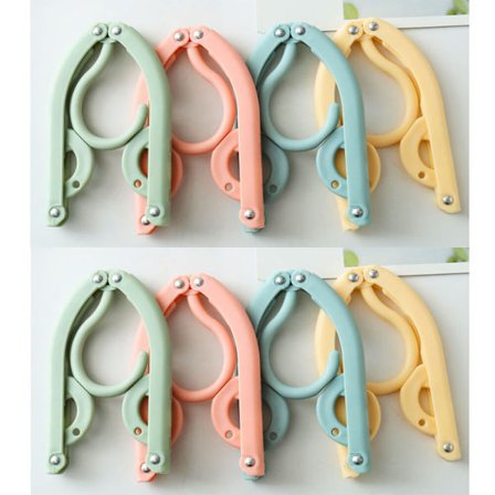 8-pakks sammenleggbare reisehengere i 4 farger, bærbar kleshenger