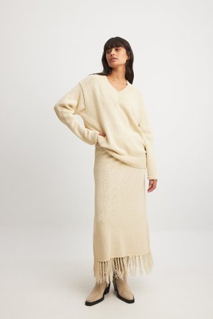 NA-KD Jupe mi-longue en maille à franges - Jupes en tricot - Beige - S