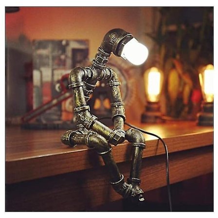 Vintage retro robot industriellt järn vattenrör bord