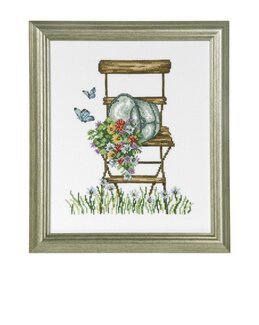 Bild Stuhl mit Blumen