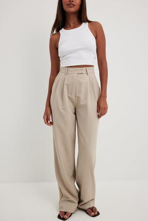NA-KD Trend Plisserade byxor med vida ben och hög midja - Kontorskläder - Beige - EU 38