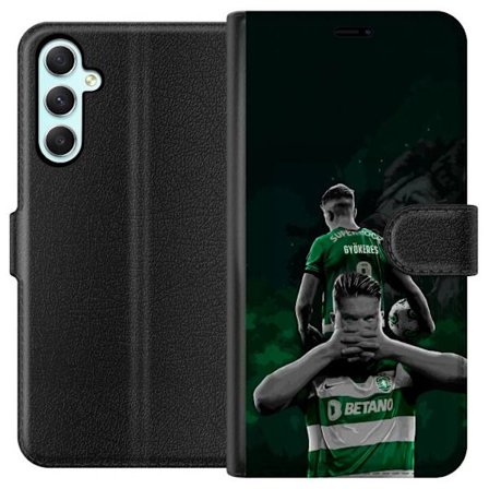 Kompatibelt Lommeboketui til Samsung Galaxy A34 Neonmotiv med teksten "Gaming is in my DNA" på en blå og rød murvegg med en lysende DNA-spiral.