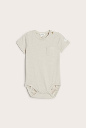 Newbie | Lyhythihainen body, jossa rintatasku | Beige