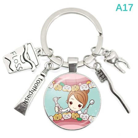 Ny Creative e tegneseriemønster tannlegemedalje nøkkelring tannlege