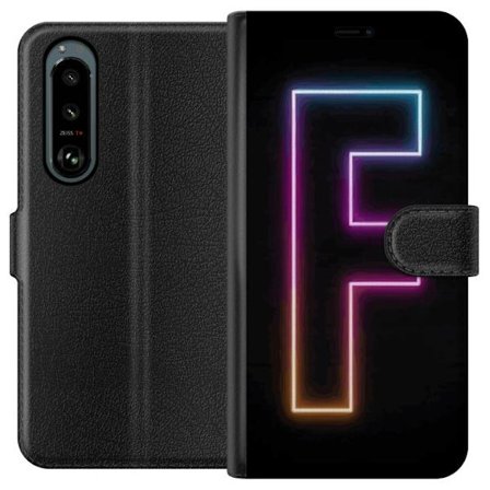 Kompatibelt Lommeboketui til Sony Sony Xperia 5 III Neonbokstav F i rosa, blå og gule lyskanter mot en mørk bakgrunn, grafisk bokstavillustrasjon me