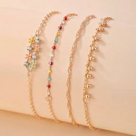 Sett med 4 orientalske rhodiumbelagte armbånd med steinsmykker