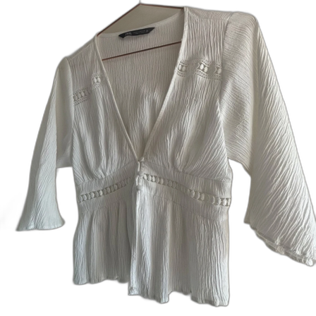 Vit blus med spetsdetaljer från Zara