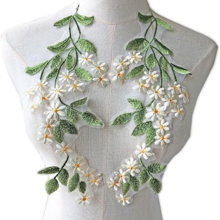 Grønne blade Blomsterblonde applikationer til broderitræ