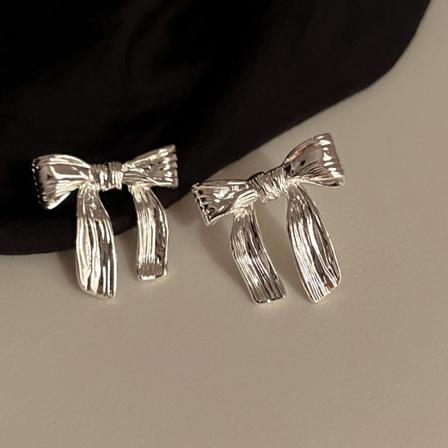 Ruostumattomasta teräksestä valmistettu metalli Bowknot Bow Stud Korvakorut Trendikäs Charm Ve A2