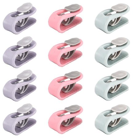 12 stk dynetrekkklemmer og lakenstrammere, lakenstrammet