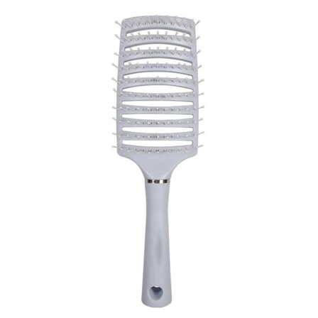 TG En borste som separerar håret och tar bort tovor blå