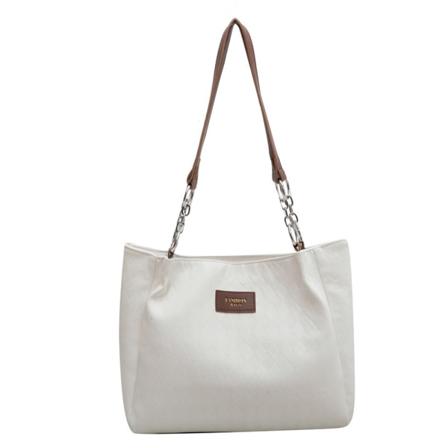 Rymlig PU-läderhandväska lämplig för pendling till skolan