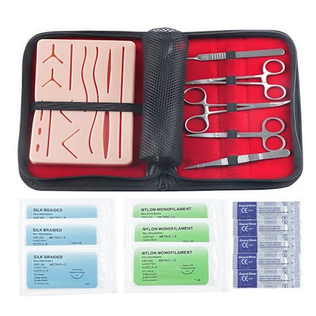 Et komplet sutursæt til studerende, inklusive silikone suturpuder og suturværktøjer til at øve suturering.