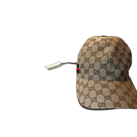 Gucci keps med GG-mönster och läderdetalj