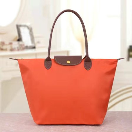 Uudet Longchamp Le Pliage -laukut naisille Z X Oranssit