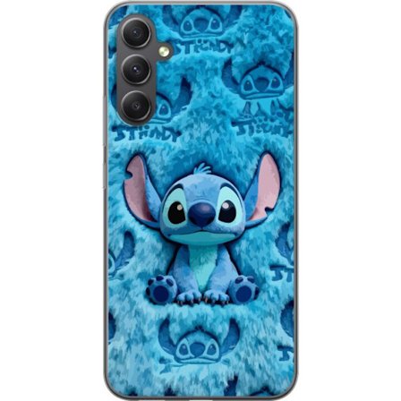 Kompatibelt Mobildeksel til Samsung Samsung Galaxy A16 5G Stitch sitter på fluffy blått mønster med sitt ansikt og ører gjentatt som tekstur, noe