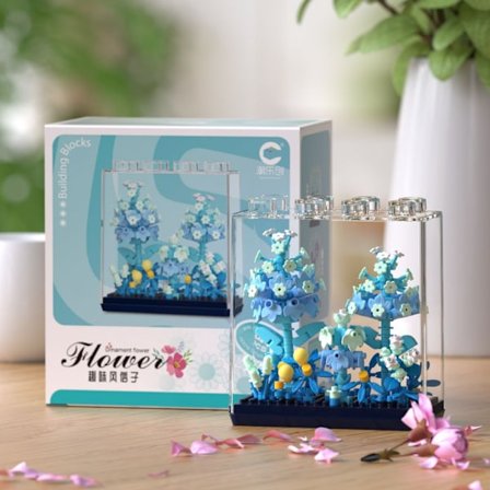 Ikuinen unelma ruukkukasvit, rakennuspalikat, kukkakimppu, auringonkukat, neilikat, lasten palapelit