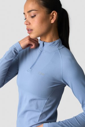 ICANIWILL - Define Seamless 1/4 Zip Metal Blue - Dames - sportkleding van ICIW